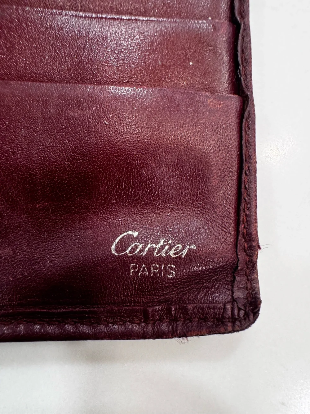 TWO!!! Cartier Men's Bifold Wallets in Burgundy with Gold Corner Accents